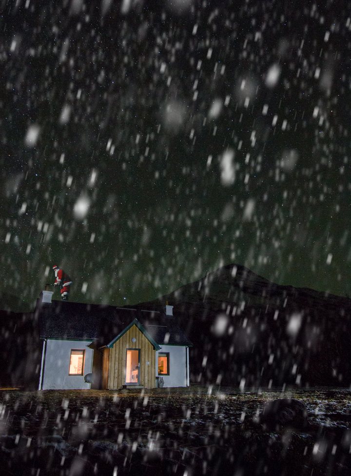 Pet friendly holiday cottage on Mull, Dobhran Croft at Lochbuie pictured at night while snow is falling - the perfect place to spend Christmas on Mull