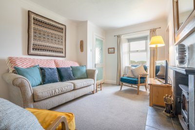 Put your feet up after a day of beachcombing and coastal walks in this comfortable cottage