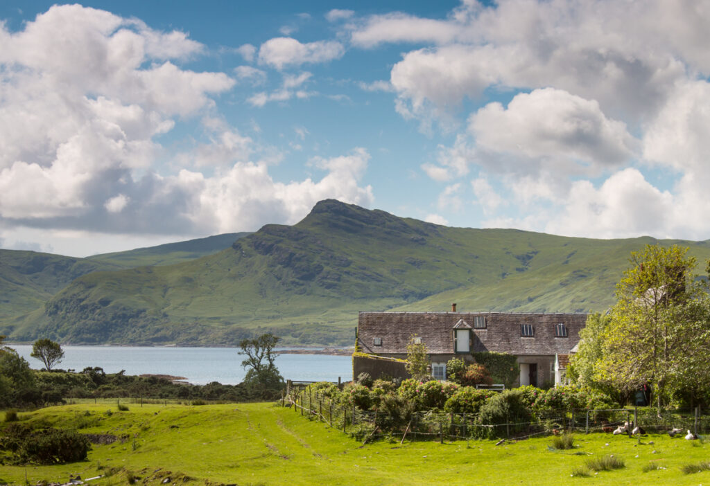 The Bothy with mountains beyond