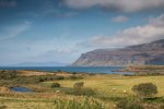 Looking across the grasslands of Ardtun towards the sea