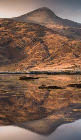 Ben more reflecting in Loch Scridain