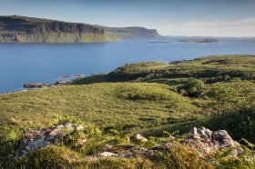 The Gribun cliffs across the waters of Loch na Keal in summer