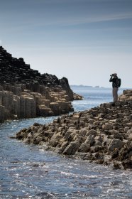 Man photographing Staffa