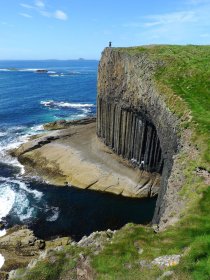 Standing atop of Staffa reached via the boat trips from Mull