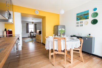 The kitchen and living room beyond