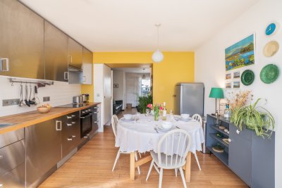 The dining kitchen is a lovely space with an open plan feel