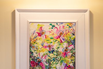 Original artworks add style throughout the cottage