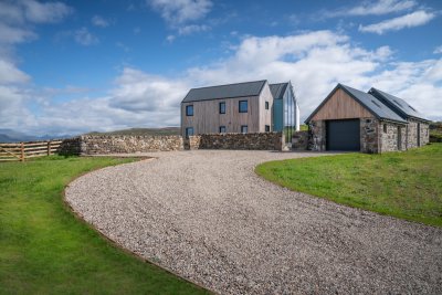 Grand driveway leading to this large property for eight