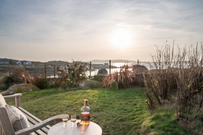Enjoy the garden sitting area with sea views