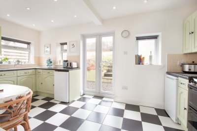 Kitchen with doors to garden