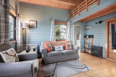 Open-plan living area at Assapol Lodge