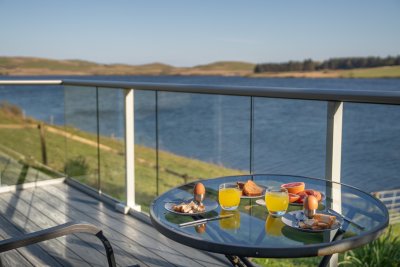 Enjoy dining alfresco with luxury loch views