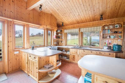 Kitchen and door leading to decking