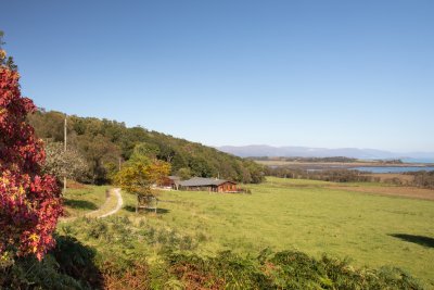 Approach to the lodge down a private gravel track