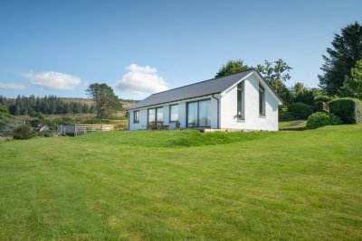 Balach Oir set in a lovely garden mainly laid to lawn with superb sea views