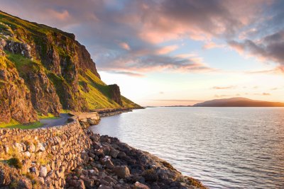 The beautiful single-track road winds past the Gribun cliffs before descending to Balmeanach Farmhouse