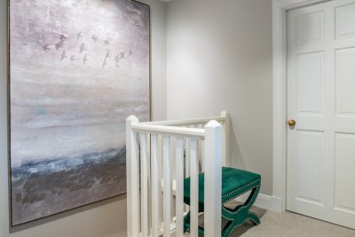 Ascend this staircase to reach two more of Balmeanach Farmhouse's sumptuously furnished bedrooms