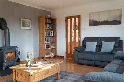 The wood burning stove makes a lovely feature in the living room