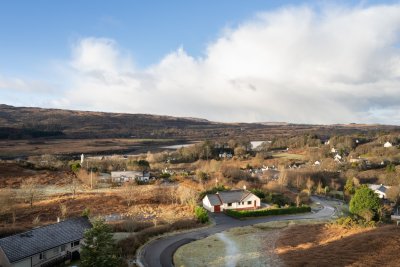 Brackens' setting in the village on the hillside above the loch