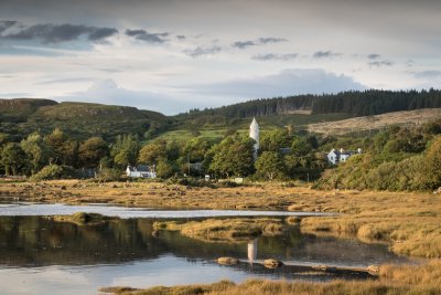 Looking into the village across the loch with the church