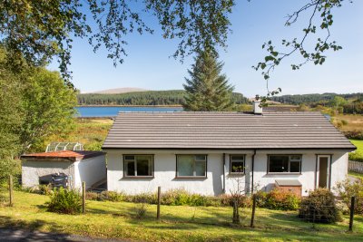 Butterfly Cottage is set well back from the main road with views out to sea