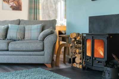 Warm up beside the log burning fire after a bracing coastal walk