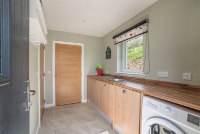 Useful utility area for laundry and belongings