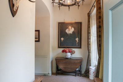 Mounted antlers and iron chandeliers for a Highland welcome