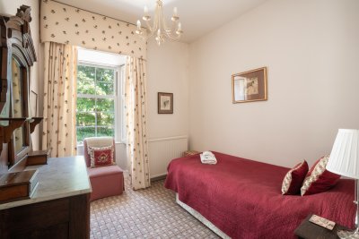 The garden view single bedroom promises a peaceful retreat