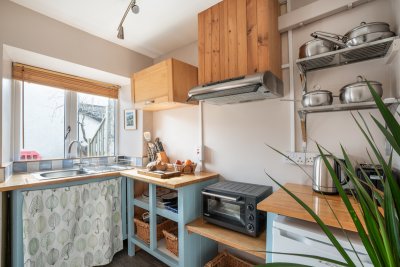 The cosy kitchen makes it simple to dine in