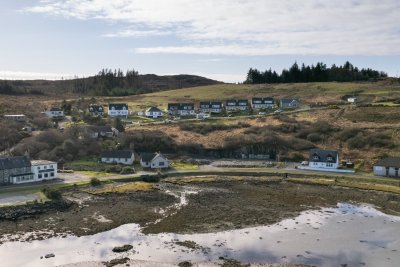 The cottage's location within the village