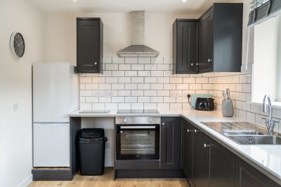 The open-plan kitchen is beautifully appointed