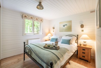 Awake to beautiful views over gardens and orchard to the hills beyond