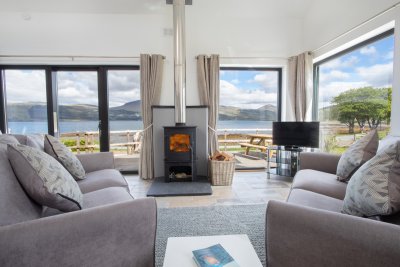 Wood burning stove and expansive windows