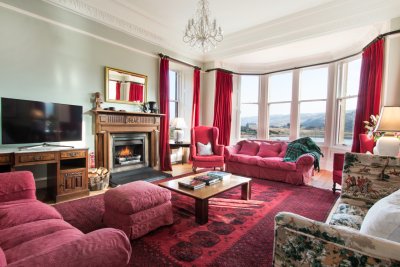 Large living room with bay window on the first floor