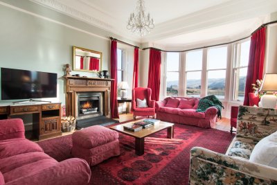 Large living room with bay window on the first floor