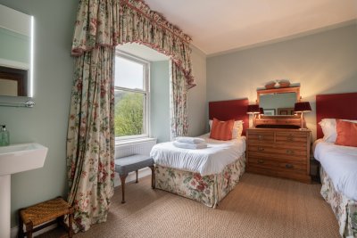 The twin bedroom is light and airy