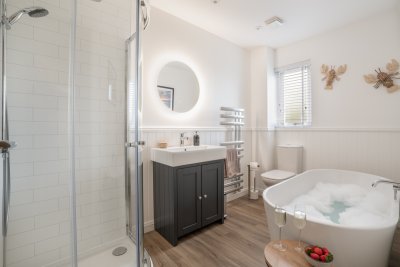 Indulge in the ground floor bathroom with free-standing tub