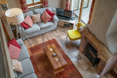 Looking down to the living area from the gallery landing