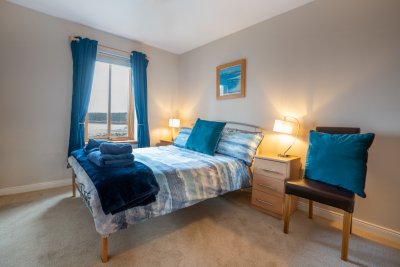 Wake up and watch the tide roll in from the second double bedroom on the ground floor