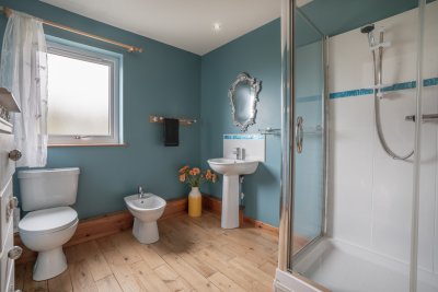 Well-appointed and equally spacious ground-floor bathroom