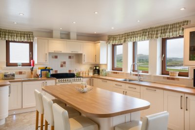 The lovely breakfast bar offers a superb view in this spacious kitchen
