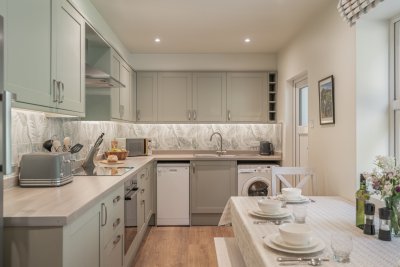 The well-appointed kitchen makes it simple to dine in