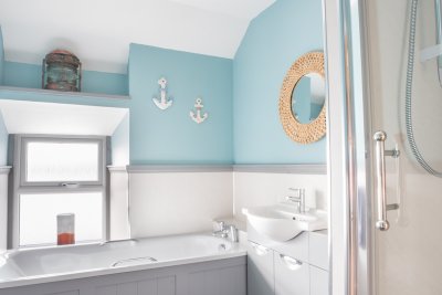Family bathroom with bath and shower unit