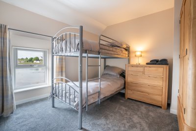 The second bedroom with bunk beds