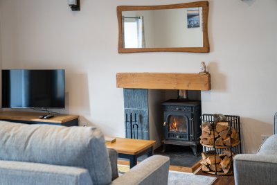 The stove adds a cosy glow at night