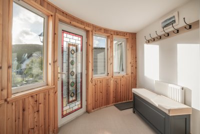 The spacious porch offers ample room for binoculars and beach gear
