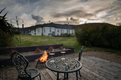 Gather around the cosy fire pit and enjoy the westerly sunsets