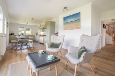 Enjoy the sitting area for a glass of something while the chef gets to work
