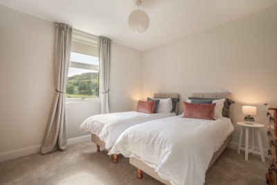 The light-filled twin bedroom